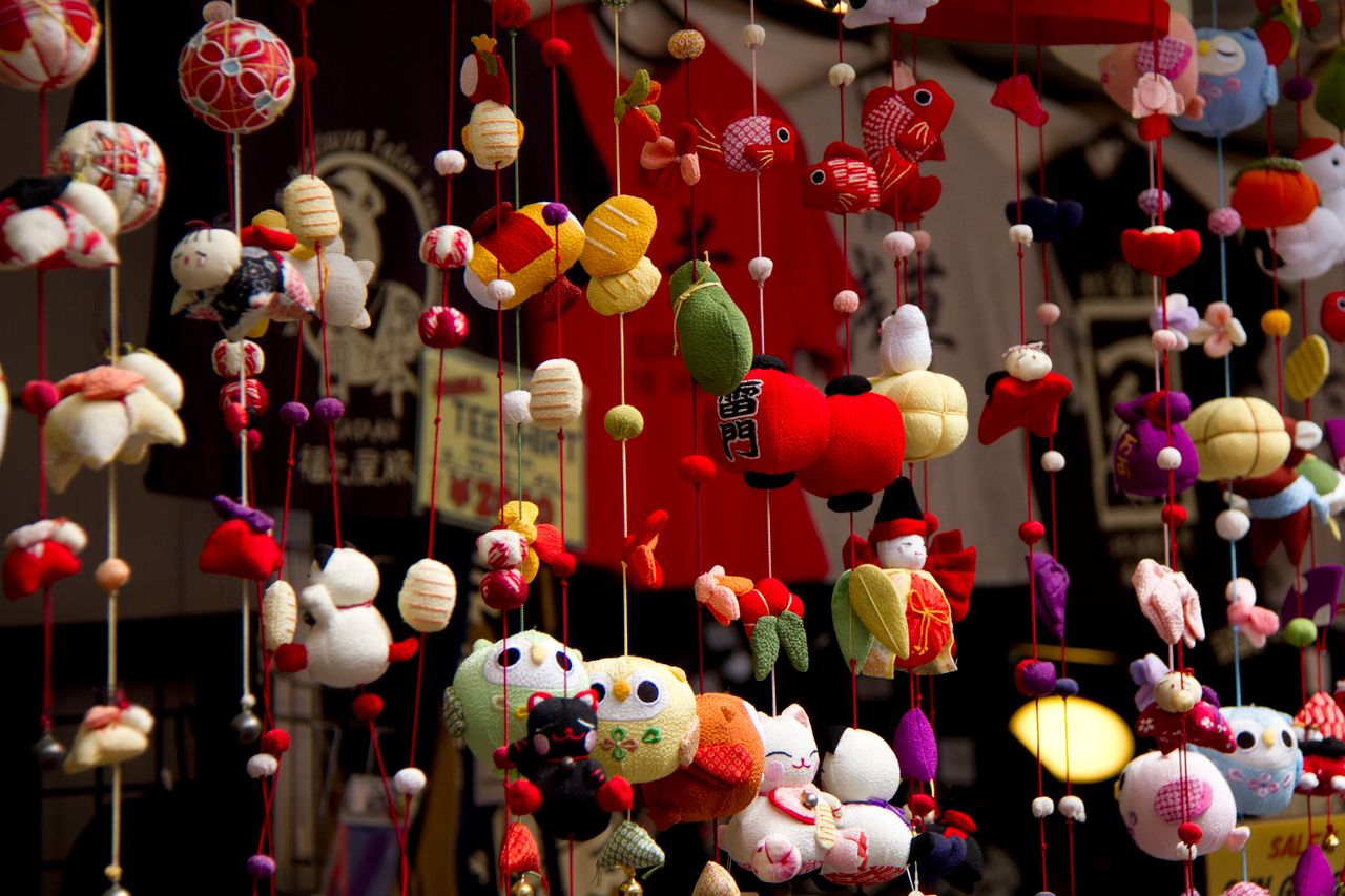 vibrant japanese ornaments hanging in a shop display showcasing cultur