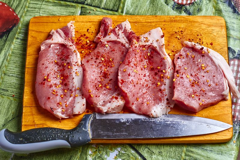 Freshly cut pork chops ready for cooking