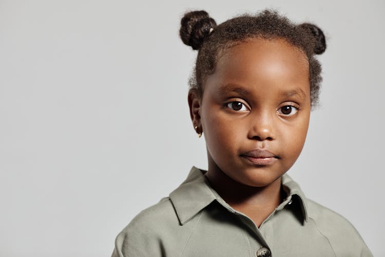 Child With Pigtail Hairstyle