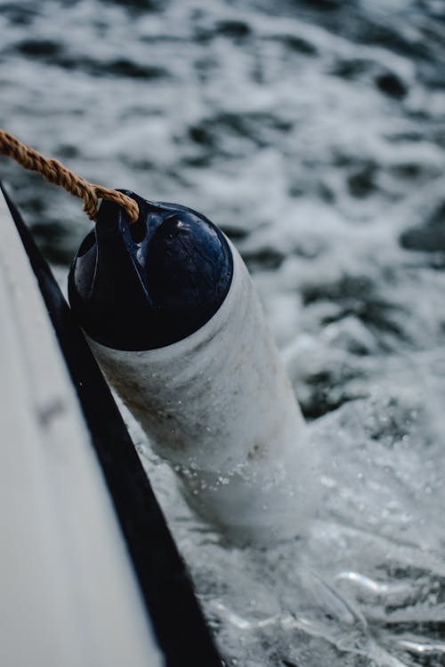 Buoy Tied to a Boat in the Water