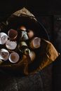White Ceramic Bowls on Brown Paper Bag