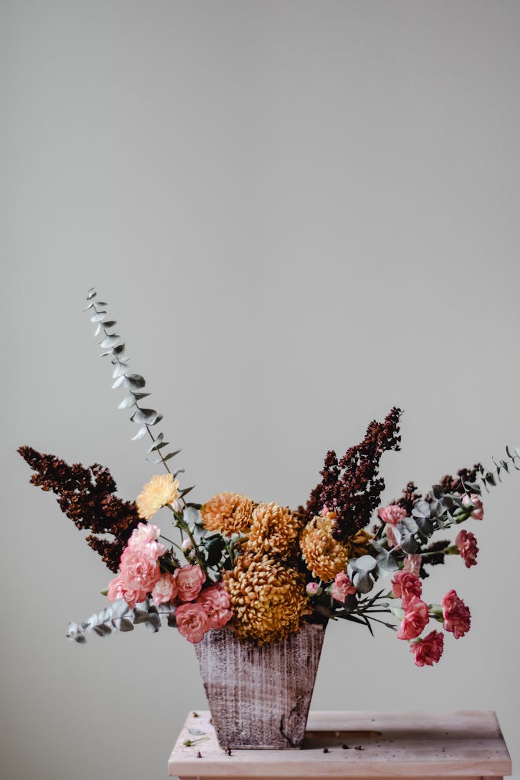 Bouquet Of Flowers On Table In Room