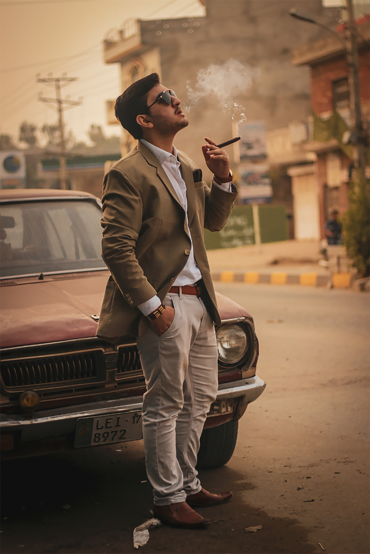Man in suit smoking cigar