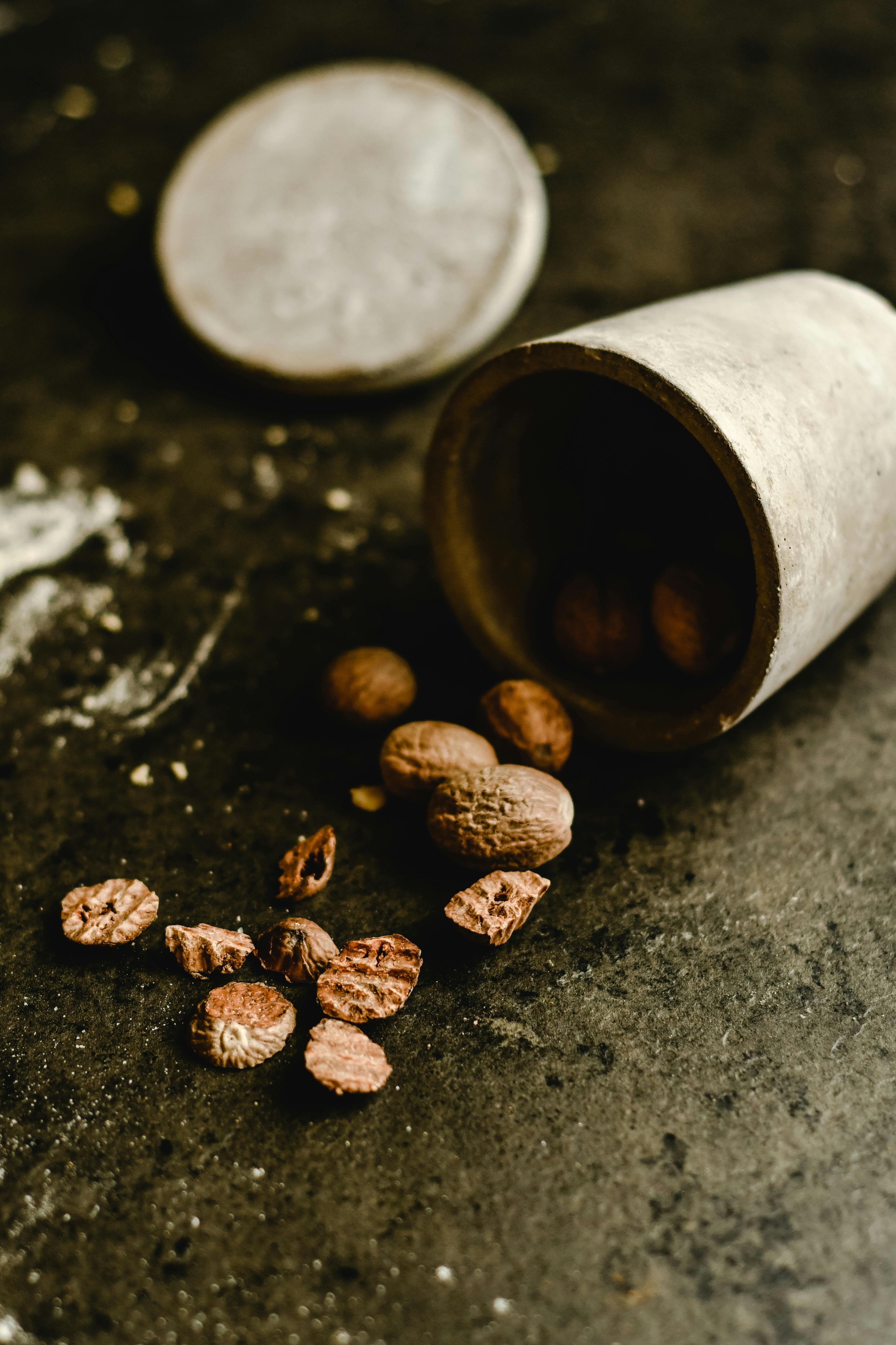 Brown Coffee Beans on Black Surface