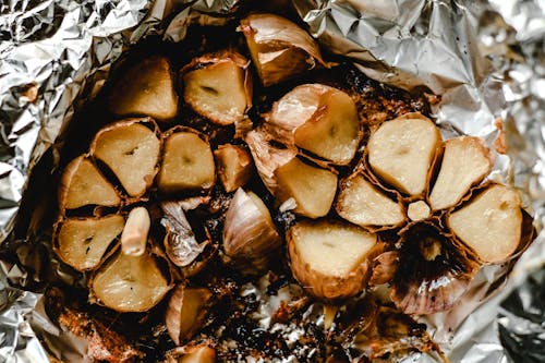 Free Baked Garlic on Foil Stock Photo