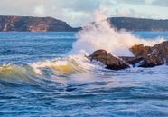 Ocean Waves Crashing On Rocks