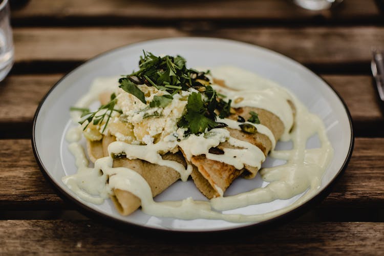 Pancakes With Dressing On Plate