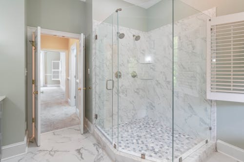 Free White Marble Tiled Shower Cabin Stock Photo