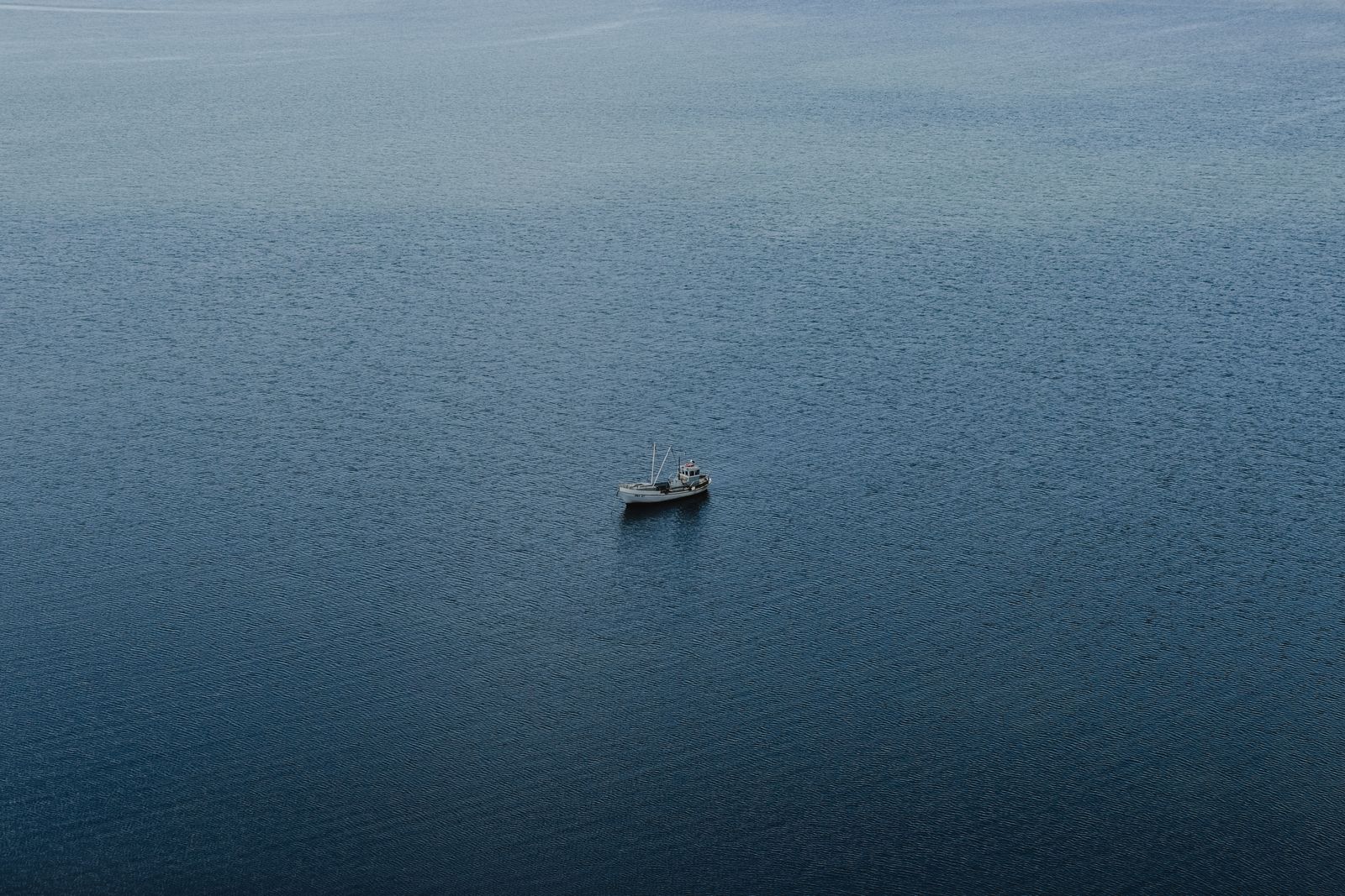 Drum Runner easing across calm, flat sound water