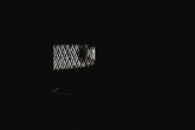 Black Metal Cage With White Light