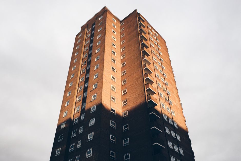 A tall residential apartment building with a classic facade in Brighton, England, representative of a dwelling supply automatically disapplied from an option to tax under VATA 1994 Sch 10 para 5