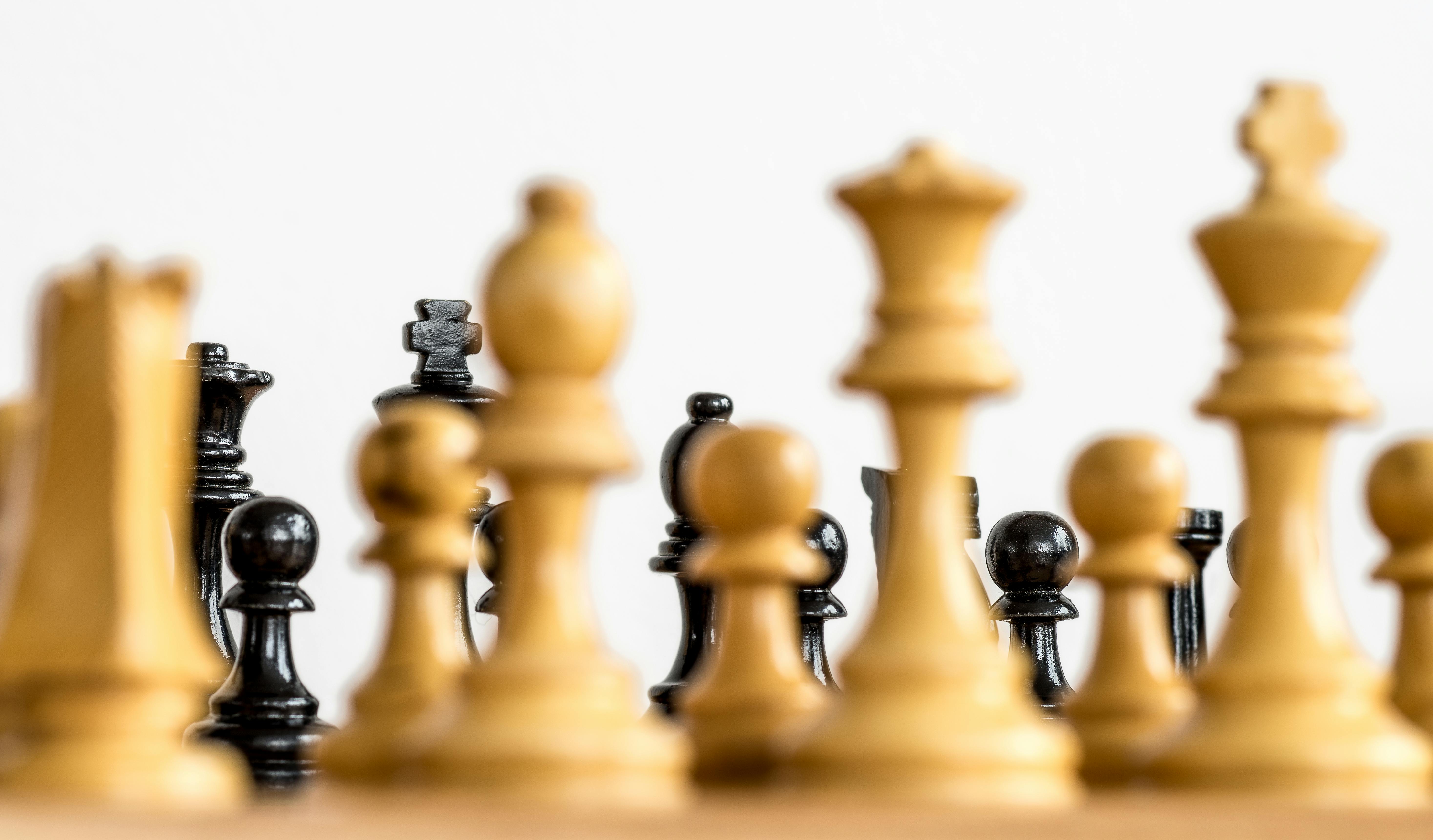 Close-Up Shot of Chess Pieces · Free Stock Photo