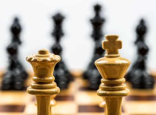 Free Detailed view of a chessboard with focus on the front pieces. Stock Photo