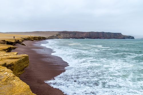 Free Scenic view of rocky coastal cliffs with waves crashing, ideal for travel and nature themes. Stock Photo