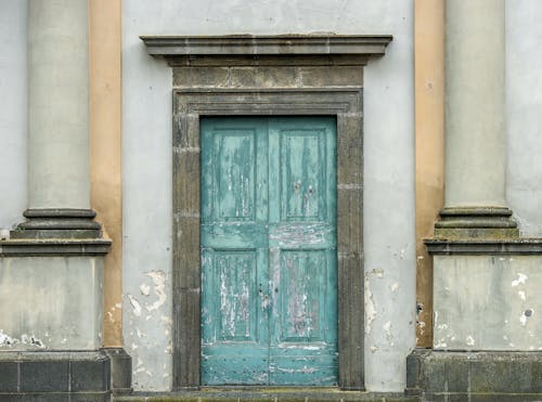 A Dilapidated Blue Wooden Door