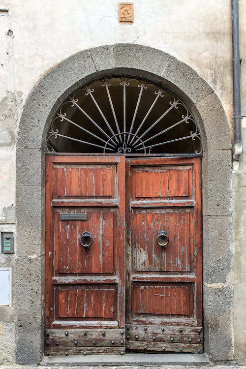 A Dilapidated Brown Wooden Door