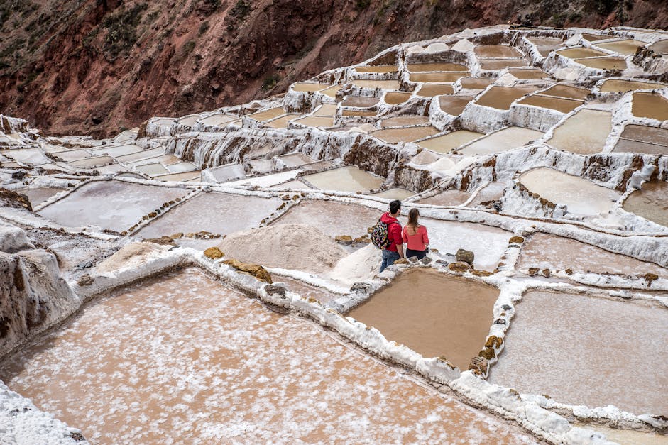 Tourists Visiting Ancient Saline Terraces in Andes Peru · Free Stock Photo