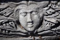 Gray Concrete Human Face Carved Decor
