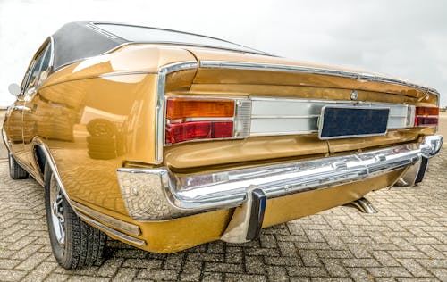 A Brown Coupe Vintage Car Parked on the Pavement