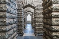 Brown Brick Hallway With No People