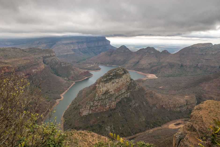 Ultimate Sunset Aquila Private Game Reserve Big 5 Safari with Snacks Review 2026 - A breathtaking aerial view of Blyde River Canyon with rocky landscapes and cloudy sky.