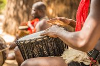 A Person Playing a Drum