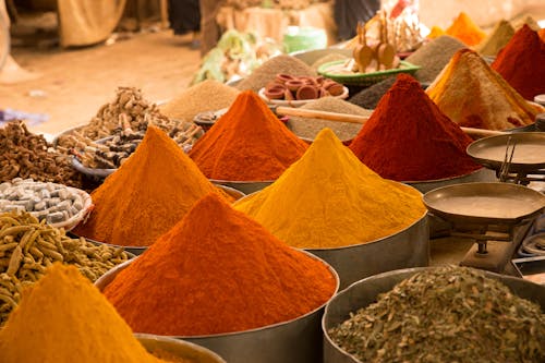 Free Orange and Red Spices on Street Market Stock Photo