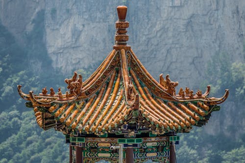 Close up of Pagoda Roof and Mountain in Background
