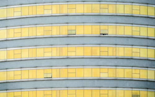 Yellow Windows of Gray Building