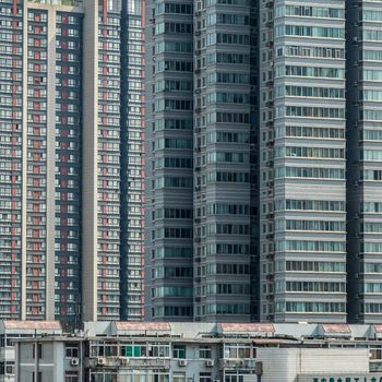 Close-up view of high-density residential skyscrapers showcasing urban architecture.