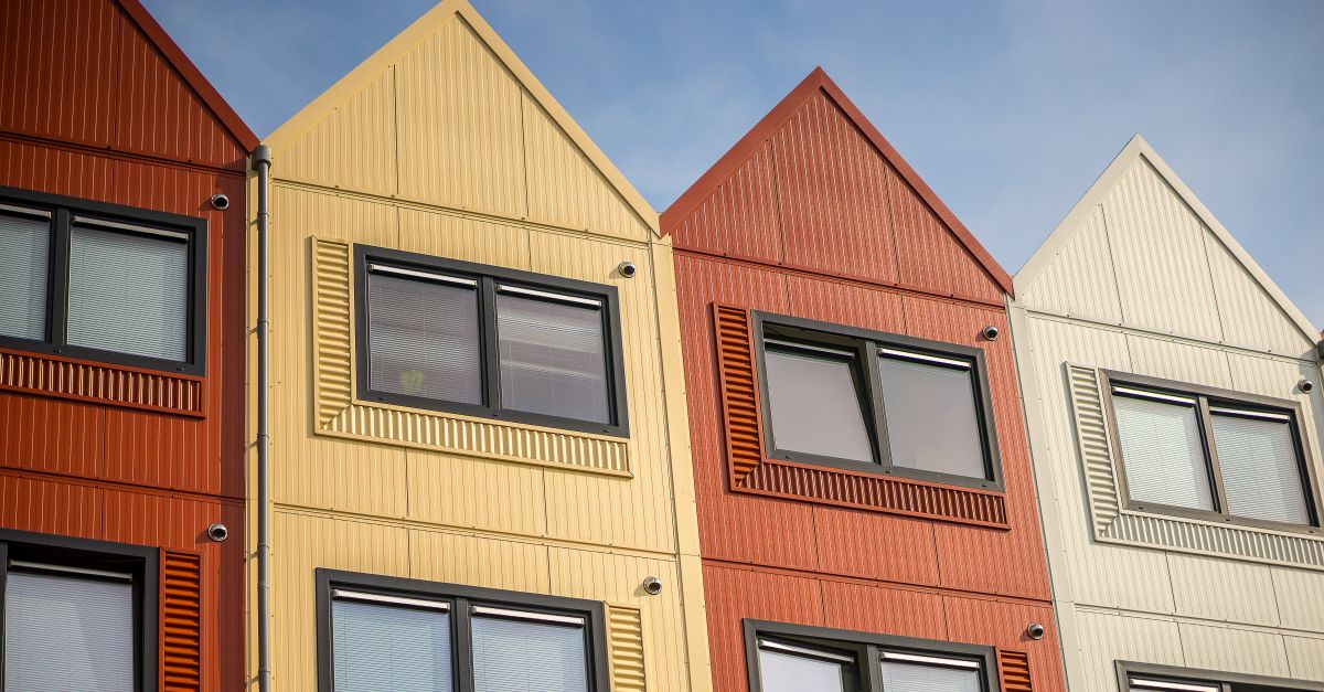Vibrant apartment facades with distinct designs and colors.