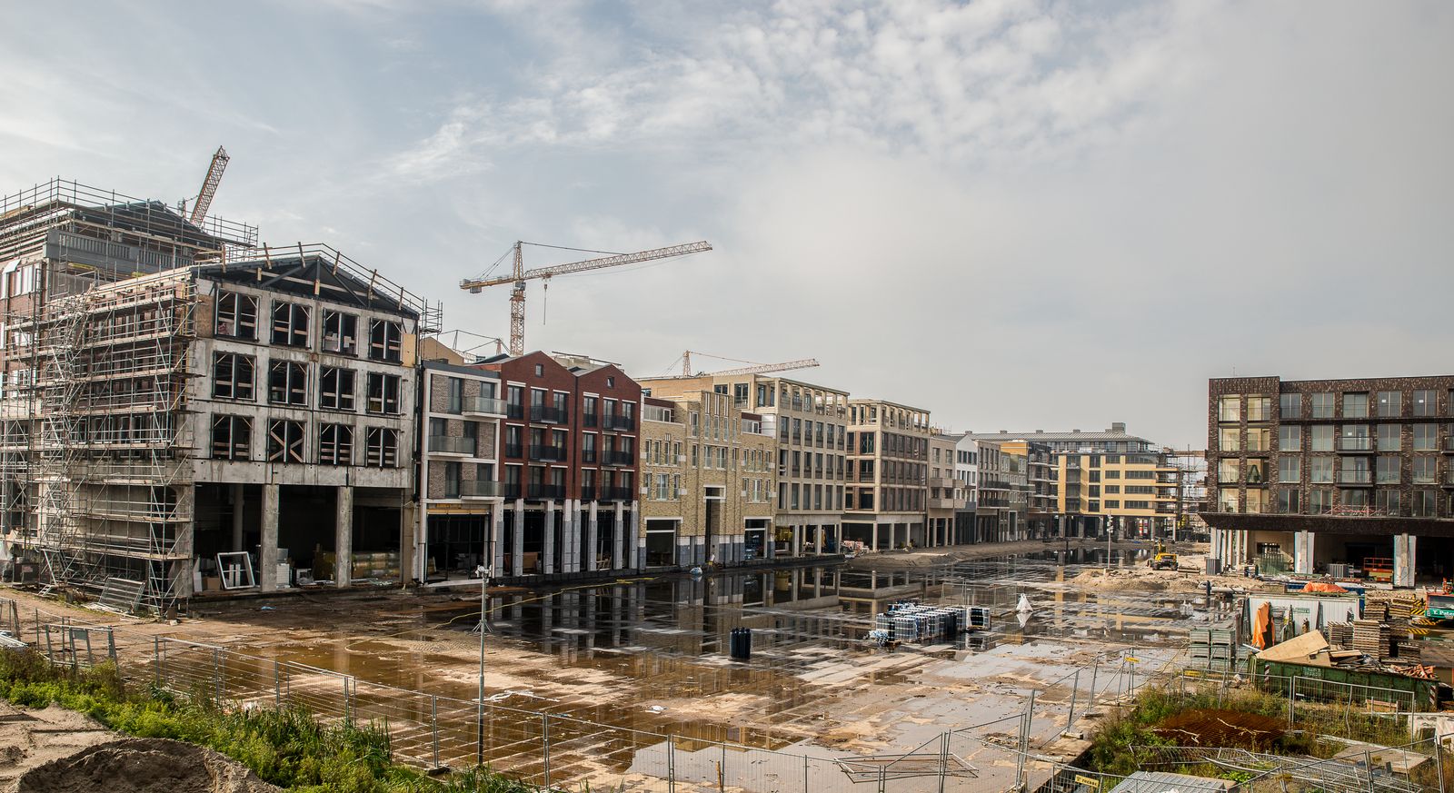Construction sites with a variety of modern architecture designs — the Commercial branch turning ideas into buildings.