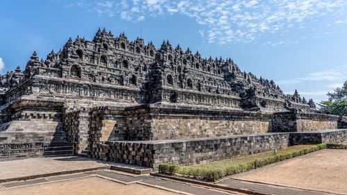 Free Borobudur Temple, a stunning Buddhist monument in Indonesia, showcases intricate ancient architecture. Stock Photo