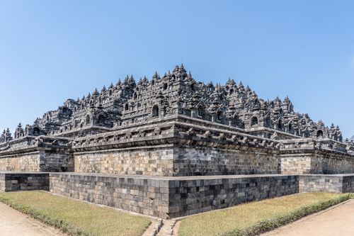 Free A stunning view of the ancient Borobudur Temple, illustrating its intricate architecture and stone carvings. Stock Photo