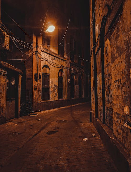 Free stock photo of city at night, empty street, old buildings Stock Photo