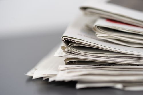 Folded newspapers, reference photo