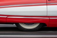 Red and White Car on Road