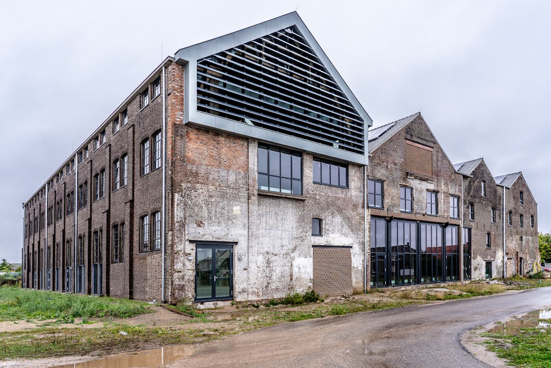 Old Factory Buildings Transformed into Modern Buildings · Free Stock Photo