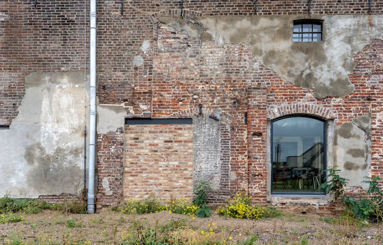 Neglected Red Brick Wall