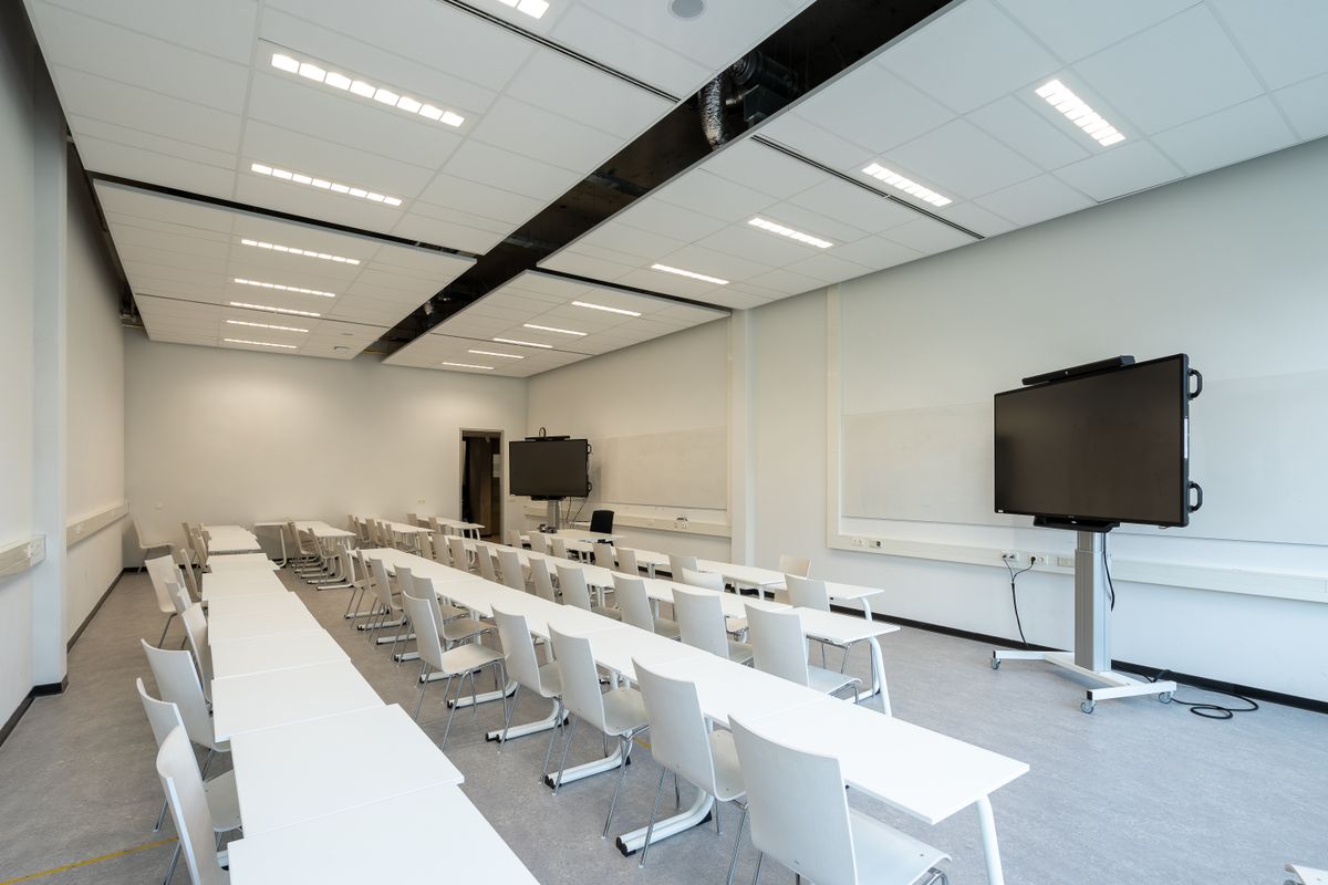 Modern conference room with integrated AV display screens