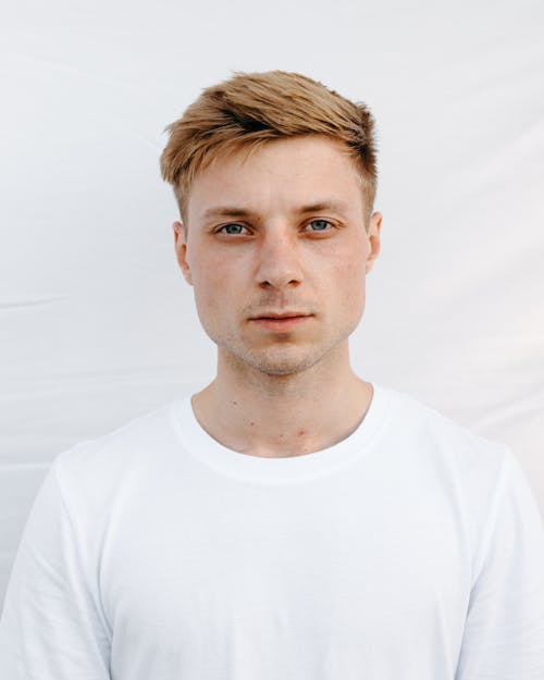 Portrait of a Man in White Crew Neck Shirt 