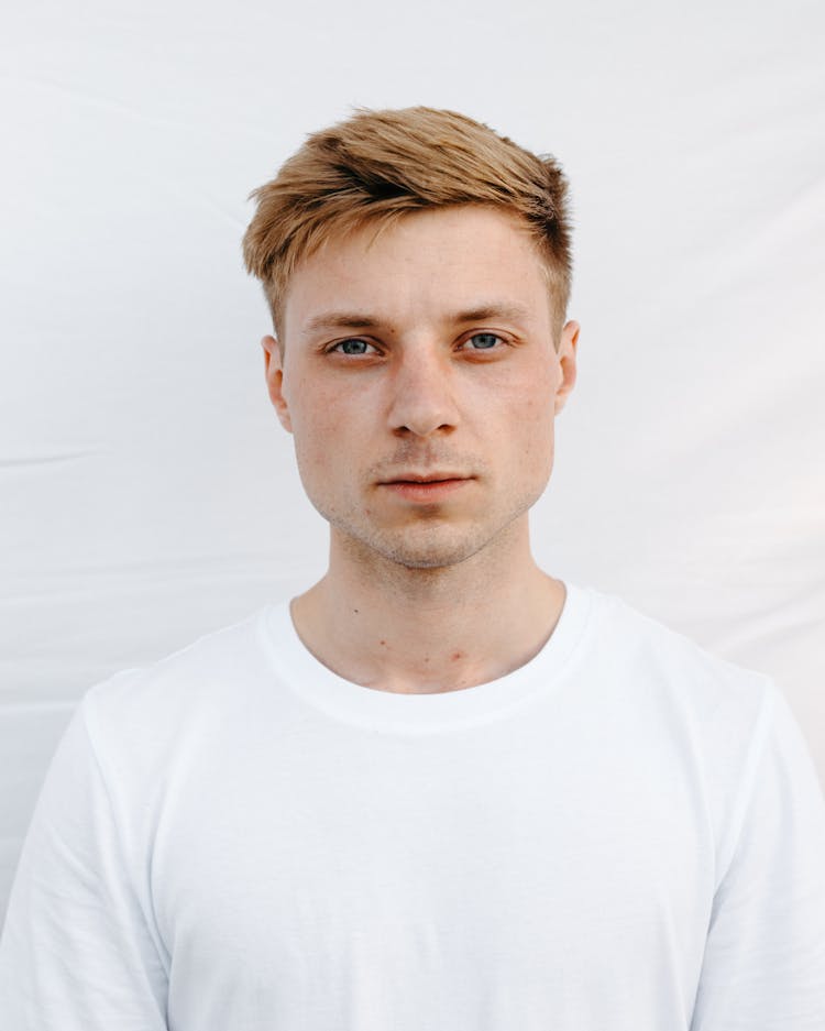 Portrait Of A Man In White Crew Neck Shirt 