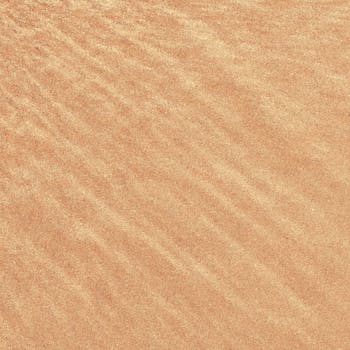 特写视图展示细砂纹理，带有微妙的自然图案