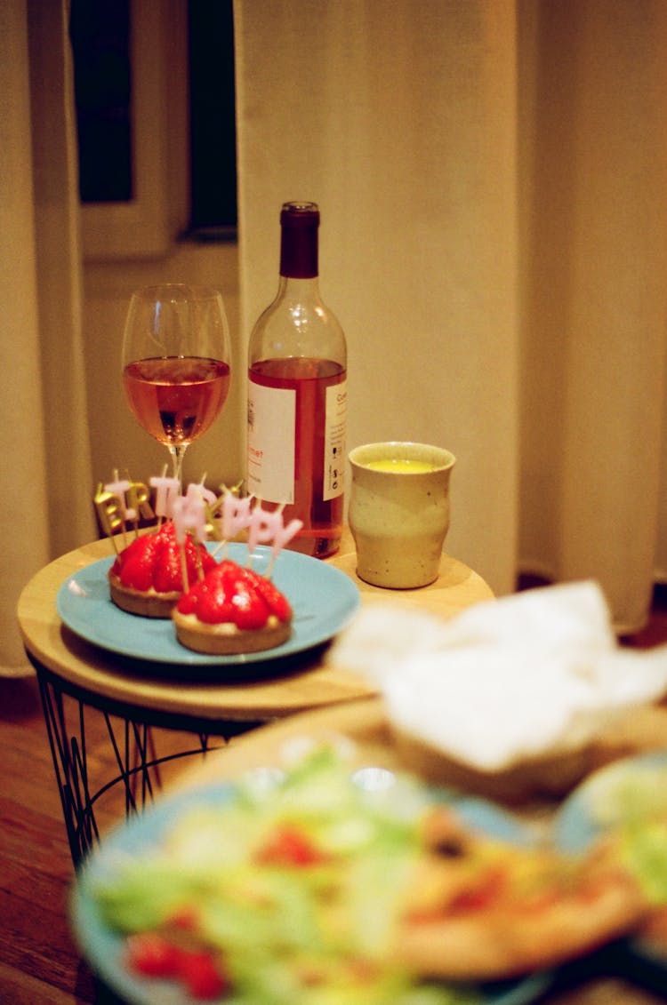 Birthday Cupcakes Served With Glass Of Wine