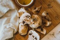 Brown and White Mushrooms on Brown Wooden Table
