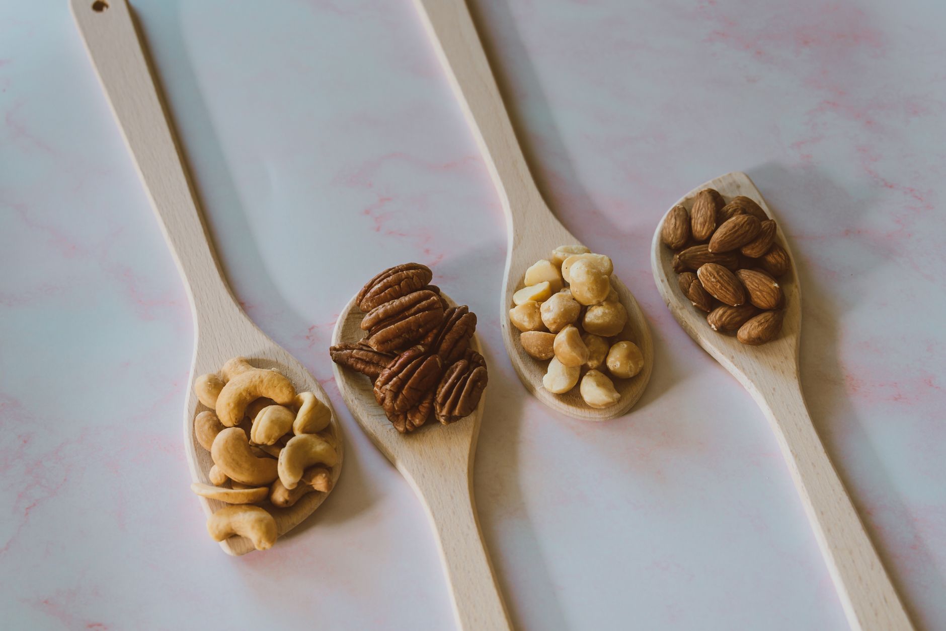 Assortment of Trader Joe‘s seasoned nuts displayed in bowls