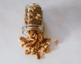 Close-Up Shot of Assorted Nuts in a Glass Jar