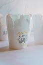 White and Black Plastic Cup
