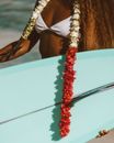 Woman in Black Brassiere and Black Panty Sitting on White Boat