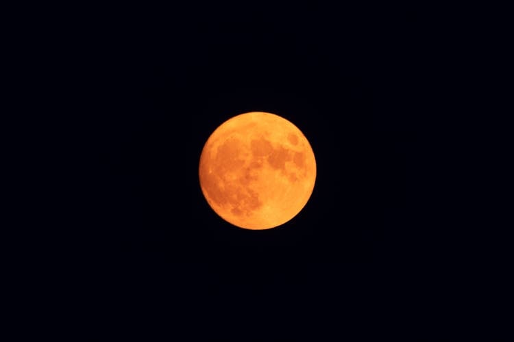 Red Moon In Dark Sky